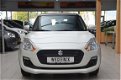 Suzuki Swift - 1.2 Wiegerinck Edition [BODYKIT SPORTLINE | LEDER | SPOILER] - 1 - Thumbnail