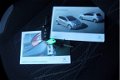 Peugeot 208 - 1.4 e-HDi Blue Lease AUTOMAAT NL-Auto Nav/airco/cruise - 1 - Thumbnail