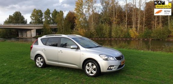 Kia Cee'd Sporty Wagon - 1.4 CVVT Seven 1e eigenaar Navi airco cruis control cv op afs elekramen - 1