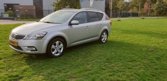 Kia Cee'd Sporty Wagon - 1.4 CVVT Seven 1e eigenaar Navi airco cruis control cv op afs elekramen - 1