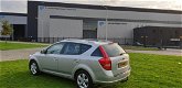 Kia Cee'd Sporty Wagon - 1.4 CVVT Seven 1e eigenaar Navi airco cruis control cv op afs elekramen - 1 - Thumbnail