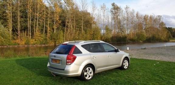 Kia Cee'd Sporty Wagon - 1.4 CVVT Seven 1e eigenaar Navi airco cruis control cv op afs elekramen - 1