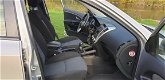 Kia Cee'd Sporty Wagon - 1.4 CVVT Seven 1e eigenaar Navi airco cruis control cv op afs elekramen - 1 - Thumbnail