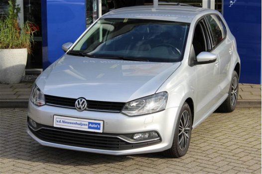 Volkswagen Polo - 1.2 TSI Highline Navi / Stoelverwarming / Clima / Lm velgen / PDC - 1