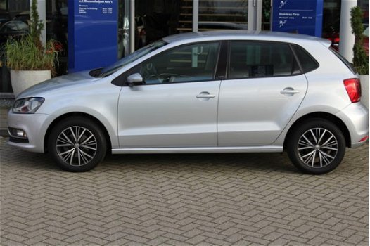 Volkswagen Polo - 1.2 TSI Highline Navi / Stoelverwarming / Clima / Lm velgen / PDC - 1