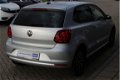 Volkswagen Polo - 1.2 TSI Highline Navi / Stoelverwarming / Clima / Lm velgen / PDC - 1 - Thumbnail