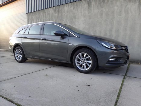 Opel Astra Sports Tourer - 1.4 Turbo Business Executive Navigatie, airco, LMV - 1