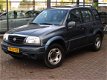 Suzuki Grand Vitara - 2.0 Airco 5 Deurs 4x4 Elektr Ramen - 1 - Thumbnail