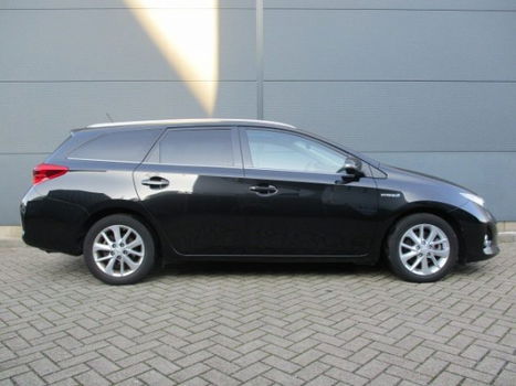 Toyota Auris Touring Sports - Fantastische auto/1.8 Hybryd/Navigatie - 1