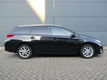 Toyota Auris Touring Sports - Fantastische auto/1.8 Hybryd/Navigatie - 1 - Thumbnail