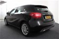 Mercedes-Benz A-klasse - 180 Aut. 7-DCT Ambition Urban (A-C/NAV/PDC/LMV 17) - 1 - Thumbnail