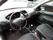 Peugeot 206 - 1.4 XS 5drs | Airco | Cruise Control | Radio CD | 1e eigenaar - 1 - Thumbnail