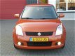 Suzuki Swift - 1.3 Exclusive , 5 Deurs, Airco, Navi, Mooi - 1 - Thumbnail