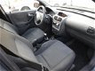 Opel Corsa - 1.2-16V Comfort - 1 - Thumbnail