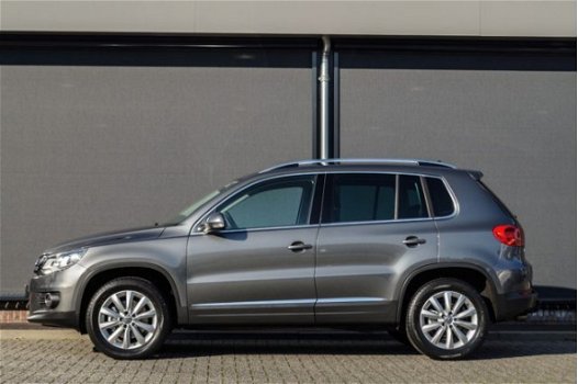 Volkswagen Tiguan - SportenStyle 180Pk DSG7 4Motion 2.0Tsi - Xenon/Navi/Trekh/PDC - 1