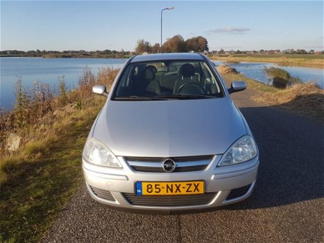 Opel Corsa - 1.2-16V Enjoy - 1