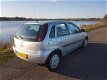 Opel Corsa - 1.2-16V Enjoy - 1 - Thumbnail