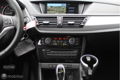 BMW X1 - 1.6d sDrive High Executive Xenon Sportstoelen Navi 19 inch lmv - 1 - Thumbnail