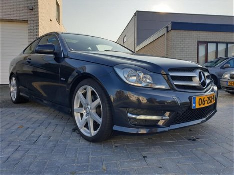 Mercedes-Benz C-klasse Coupé - 180 Edition 1 AMG Automaat Panodak Leder Navi 1e Eigenaar Nieuwstaat - 1