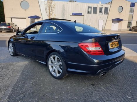 Mercedes-Benz C-klasse Coupé - 180 Edition 1 AMG Automaat Panodak Leder Navi 1e Eigenaar Nieuwstaat - 1