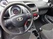 Toyota Aygo - 1.0-12V Comfort, bj.2010, 1e eigenaar, airco, 5 deurs, zwart, APK tot 02-2020, 218800 - 1 - Thumbnail