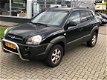 Hyundai Tucson - 2.0i Dynamic AIRCO/ELEK.R/ NAP/NETTE AUTO - 1 - Thumbnail