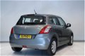 Suzuki Swift - 1.2 94PK Comfort | 5 deurs | 1e eigenaar | Airco | Stoelverw. | RadioCD | - 1 - Thumbnail