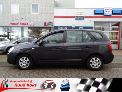 Kia Carens - 2.0 CVVT X-TRA - 1