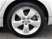 Toyota Prius - 1.8 Aspiration, Keyless Entry, Bluetooth, Climate, Cruise, Parkeersensoren achter - 1 - Thumbnail