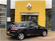Renault Clio Estate - 0.9 TCe Airco/Navi/Cruise/Bluetooth/Velgen/Armsteun/Pack Introduction - 1 - Thumbnail