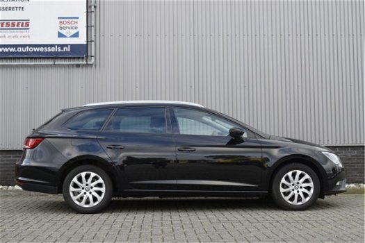 Seat Leon ST - 2.0 TDI Style PDC v+a, navi, cruise control, stoelverwarming, bluetooth - 1