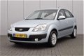 Kia Rio - 1.4 X-pect All-stars Airco Elektrisch/pakket Mistl/voor Trekhaak - 1 - Thumbnail