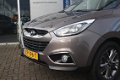 Hyundai ix35 - 1.6i-135PK / GDI i-Vision / Schuif-kanteldak / Navi / Clima / Half leder - 1 - Thumbnail