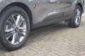 Hyundai ix35 - 1.6i-135PK / GDI i-Vision / Schuif-kanteldak / Navi / Clima / Half leder - 1 - Thumbnail