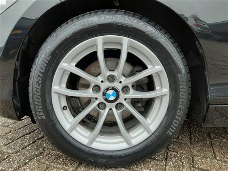 BMW 1-serie - 116i Business+ Navigatie/Climate/16inch - 1