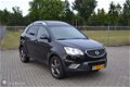 SsangYong Korando - 2.0 XDI Sapphire HR 4x4 AUT Grijs kent. Leder - 1 - Thumbnail