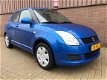 Suzuki Swift - 1.3 Comfort 5drs Nieuwe APK Dealer onderhouden - 1 - Thumbnail