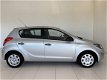 Hyundai i20 - 1.2i First Edition Airco | 1.000, - Slooppremie - 1 - Thumbnail