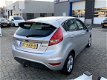 Ford Fiesta - 1.4 Titanium 5 drs | Trekhaak | Cruise Control | Achterspoiler | Automatische airco | - 1 - Thumbnail