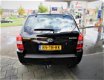 Hyundai Tucson - 2.0i Active /mooie en goed onderhouden/airco/km+nap+apk - 1 - Thumbnail