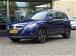 Volkswagen Tiguan - 2.0 TDI 140PK 4Motion Sport en Style Navi PDC - 1 - Thumbnail