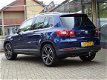 Volkswagen Tiguan - 2.0 TDI 140PK 4Motion Sport en Style Navi PDC - 1 - Thumbnail