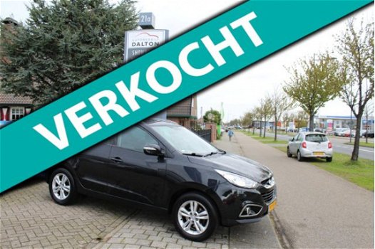 Hyundai ix35 - 2.0i Business Edition AUTOMAAT / NAVIGATIE / TREKHAAK - 1