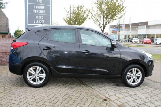 Hyundai ix35 - 2.0i Business Edition AUTOMAAT / NAVIGATIE / TREKHAAK - 1