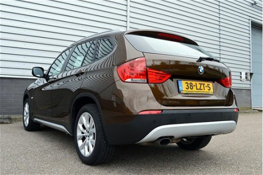 BMW X1 - 1.8i sDrive Executive RIJKLAAR PRIJS-GARANTIE Navigatie Leder Sport Interieur - 1