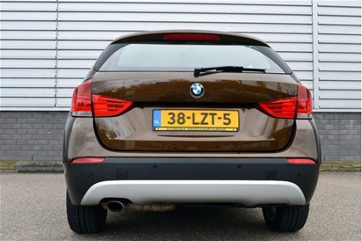 BMW X1 - 1.8i sDrive Executive RIJKLAAR PRIJS-GARANTIE Navigatie Leder Sport Interieur - 1