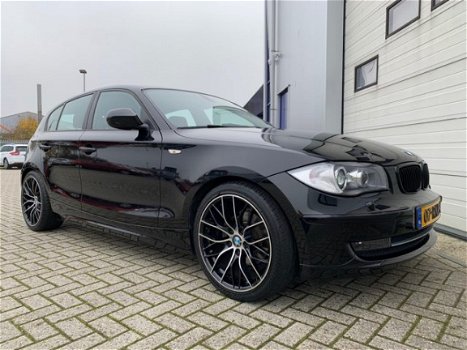 BMW 1-serie - 118i 143pk 5drs EXECUTIVE CLIMA-SPORTLEER-NAVI-LMV-XENON - 1