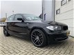 BMW 1-serie - 118i 143pk 5drs EXECUTIVE CLIMA-SPORTLEER-NAVI-LMV-XENON - 1 - Thumbnail