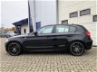 BMW 1-serie - 118i 143pk 5drs EXECUTIVE CLIMA-SPORTLEER-NAVI-LMV-XENON - 1 - Thumbnail