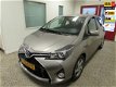 Toyota Yaris - 1.5 Hybrid Automaat | Navi | Cruise | Trekhaak - 1 - Thumbnail